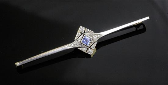 A late 1920s gold and platinum, sapphire and diamond set bar brooch, 66mm.